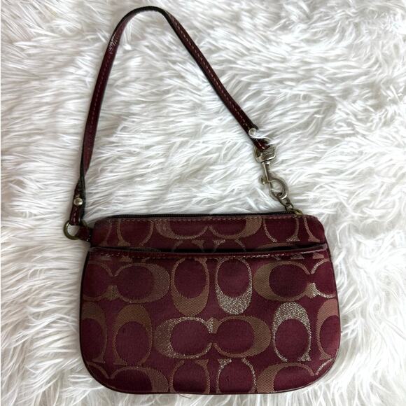 Coach Handbags - COACH Burgundy Signature Canvas Wristlet